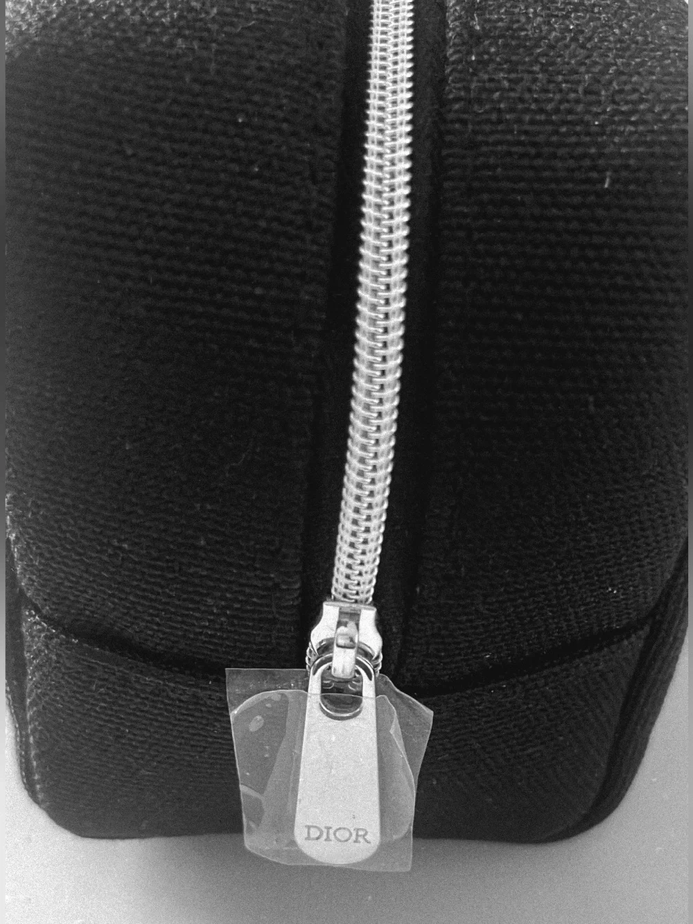 Dior Black Canvas small cosmetic/storage pouch. Canvas type material.